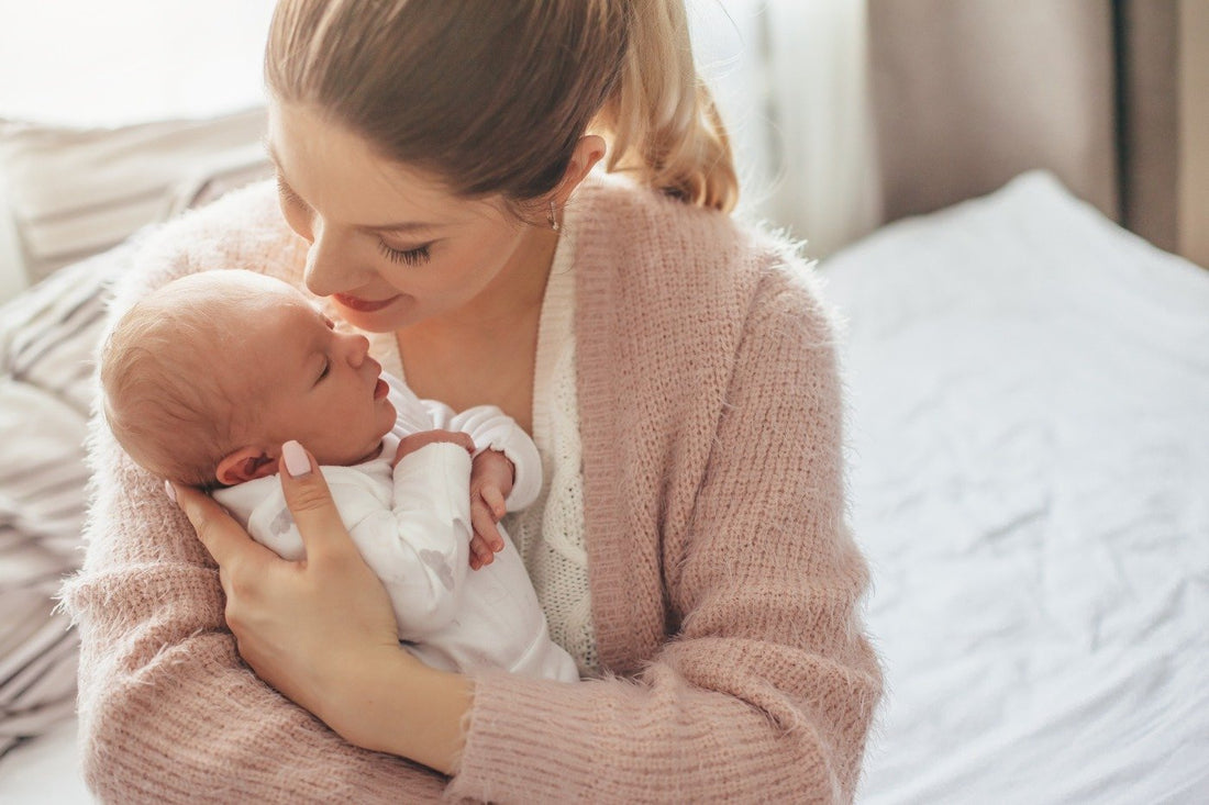 mom-holding-new-baby
